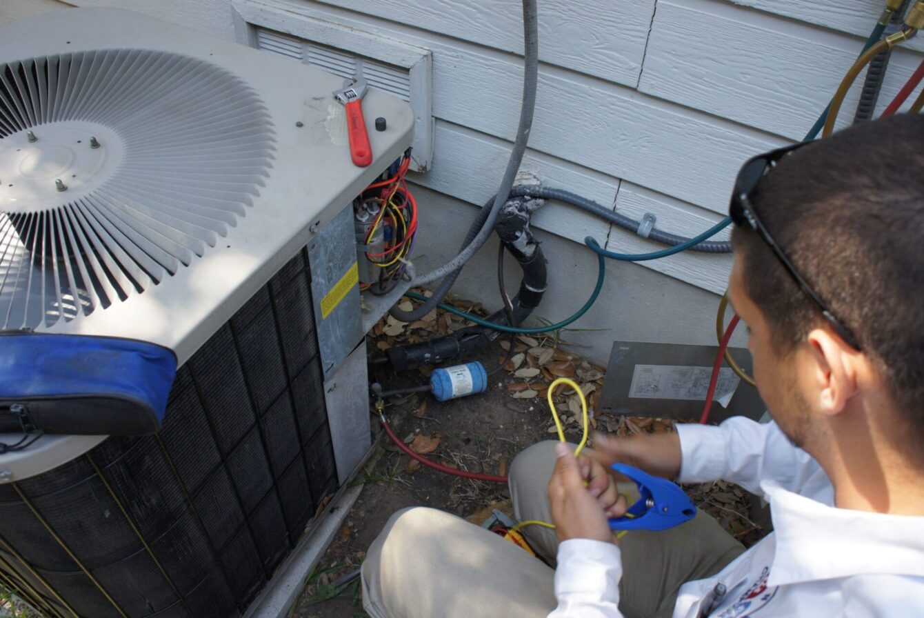 Why Is My AC Making a Rattling Noise? Champion Home Services